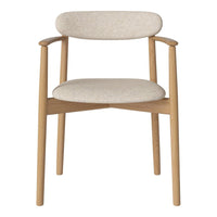 Light beige upholstered chair with natural wood frame, showcasing a minimalist design and soft texture.