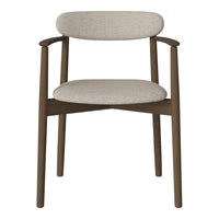 Light beige upholstered chair with a smooth round backrest and dark wooden frame, showcasing a minimalist design.