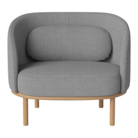 Gray upholstered chair with a rounded back and cushion, featuring wooden legs for a modern touch.