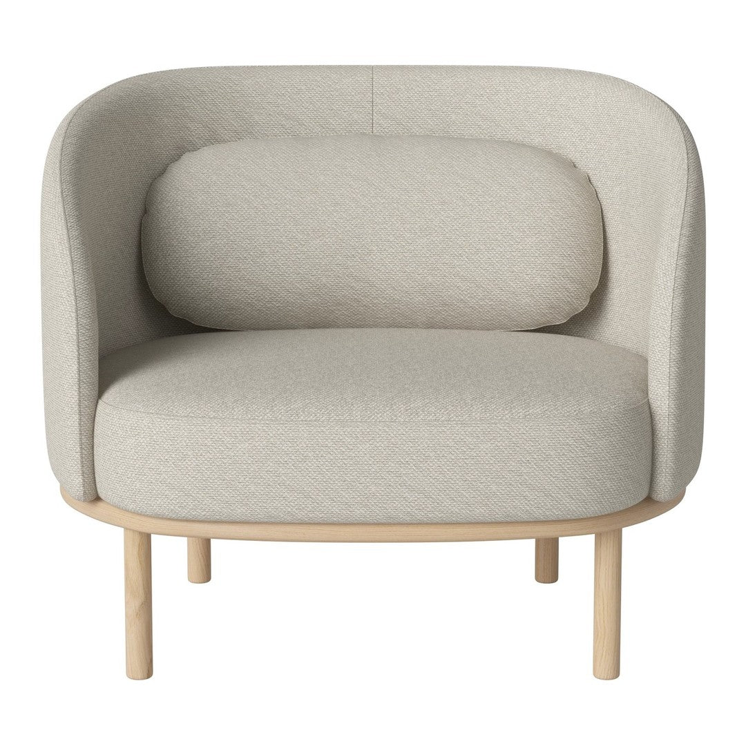 Light beige upholstered chair with soft, rounded shapes and smooth wooden legs, minimalistic design, no patterns.