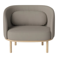Light gray upholstered armchair with a smooth texture and natural wood legs, featuring a minimalist, modern design.