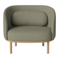Olive green upholstered chair with a smooth fabric texture, rounded shape, and natural wood legs. Modern design.