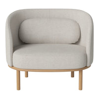 "Light gray upholstered armchair with round shape and natural wood legs, featuring a minimalist design."