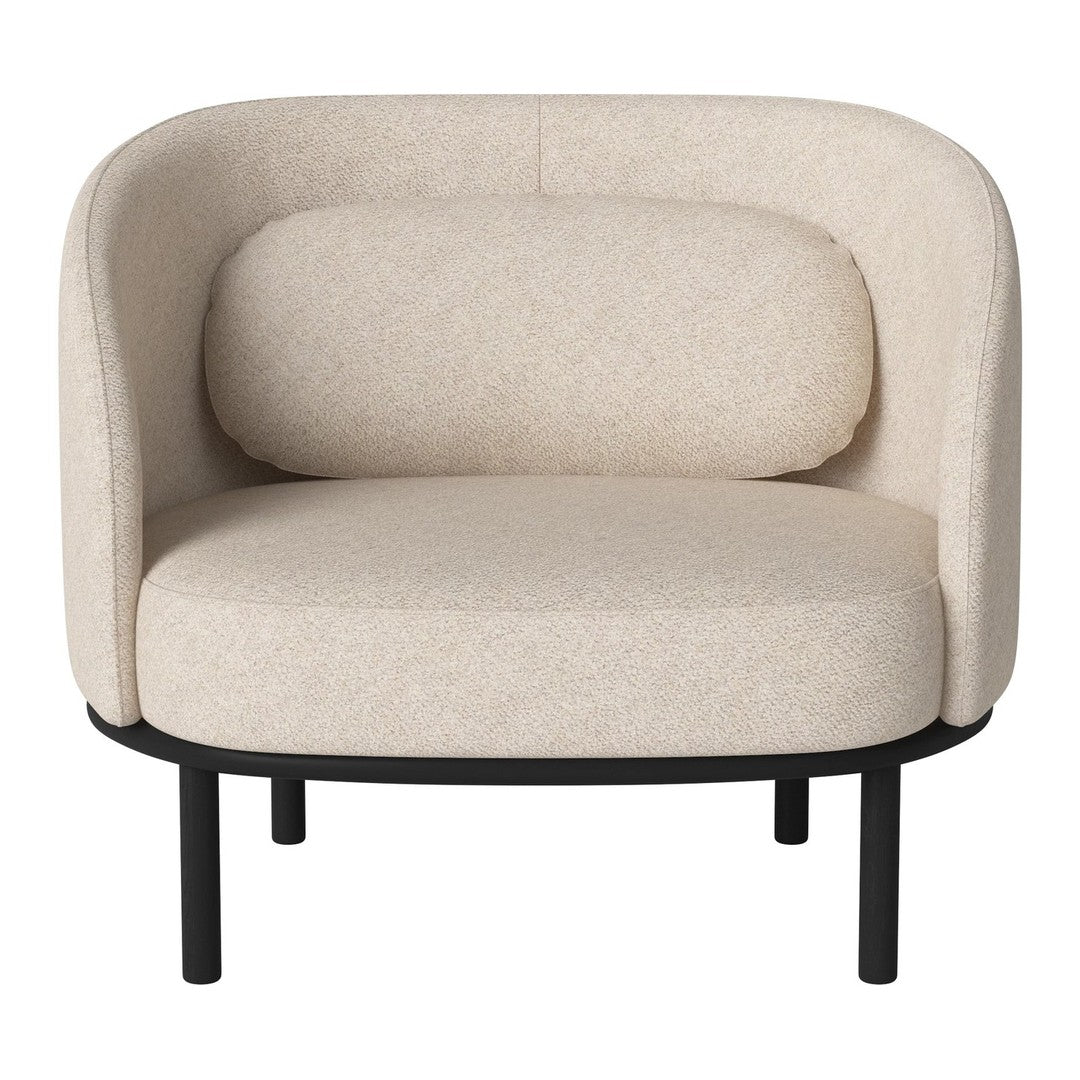 Beige upholstered chair with curved design and subtle speckled pattern, featuring black metal legs.