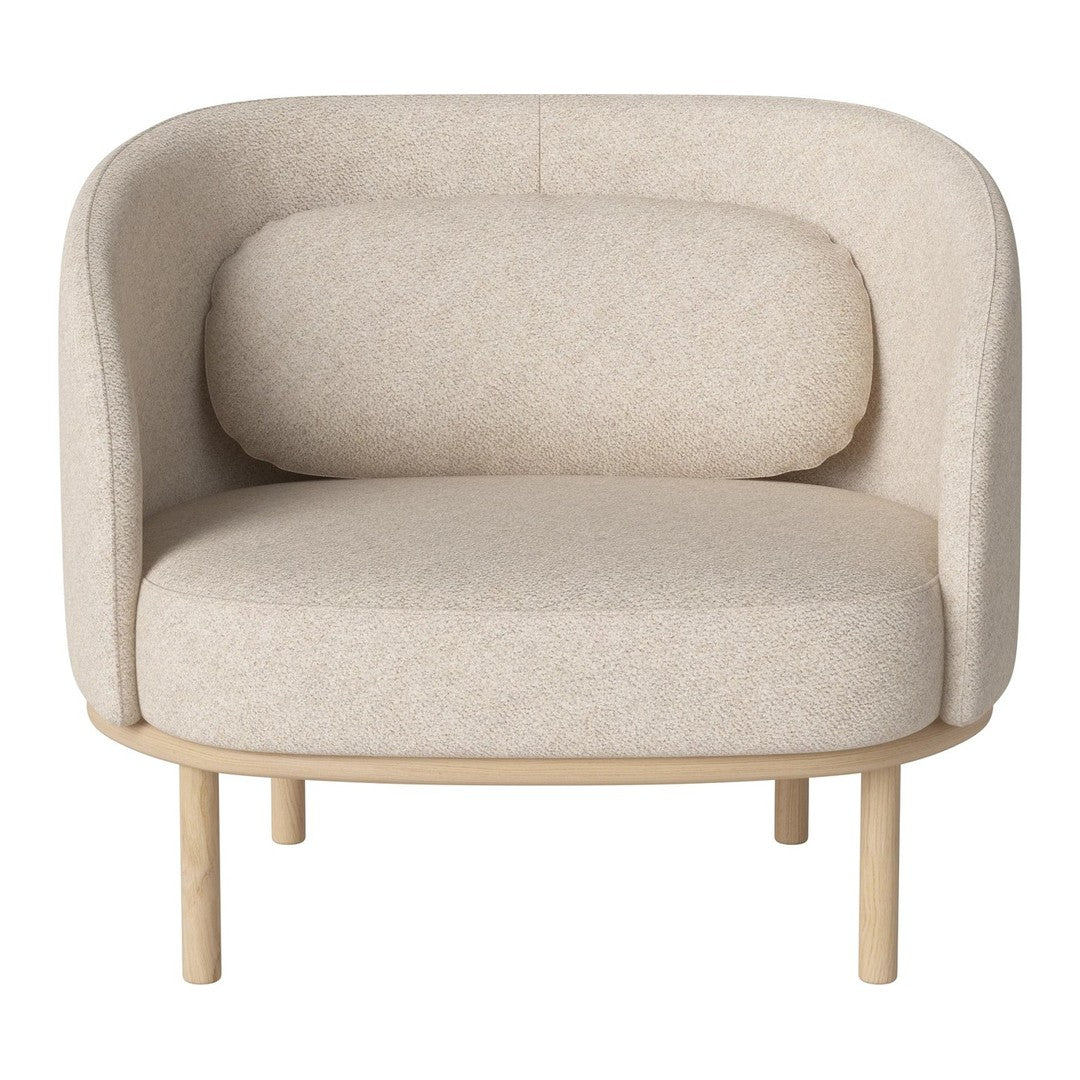Modern beige chair with a soft, textured fabric and minimalist wooden legs, perfect for a cozy living space.