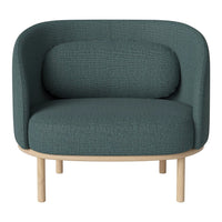 Teal upholstered chair with a textured pattern and light wooden legs, showcasing a modern and cozy design.