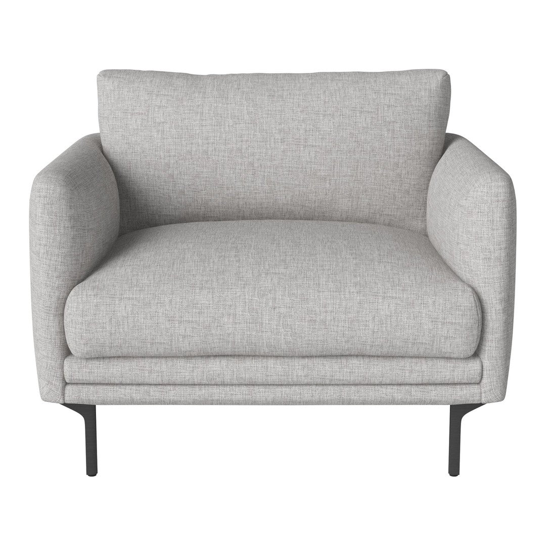 Light gray upholstered chair with smooth texture and minimalist design. Black metal legs enhance modern aesthetic.