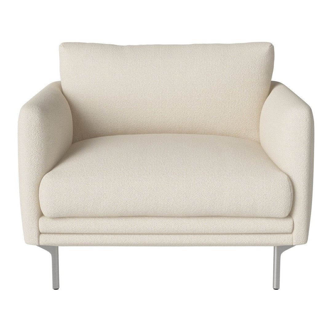 Cream-colored armchair with smooth fabric and minimalist design, featuring a sleek silver metal frame.