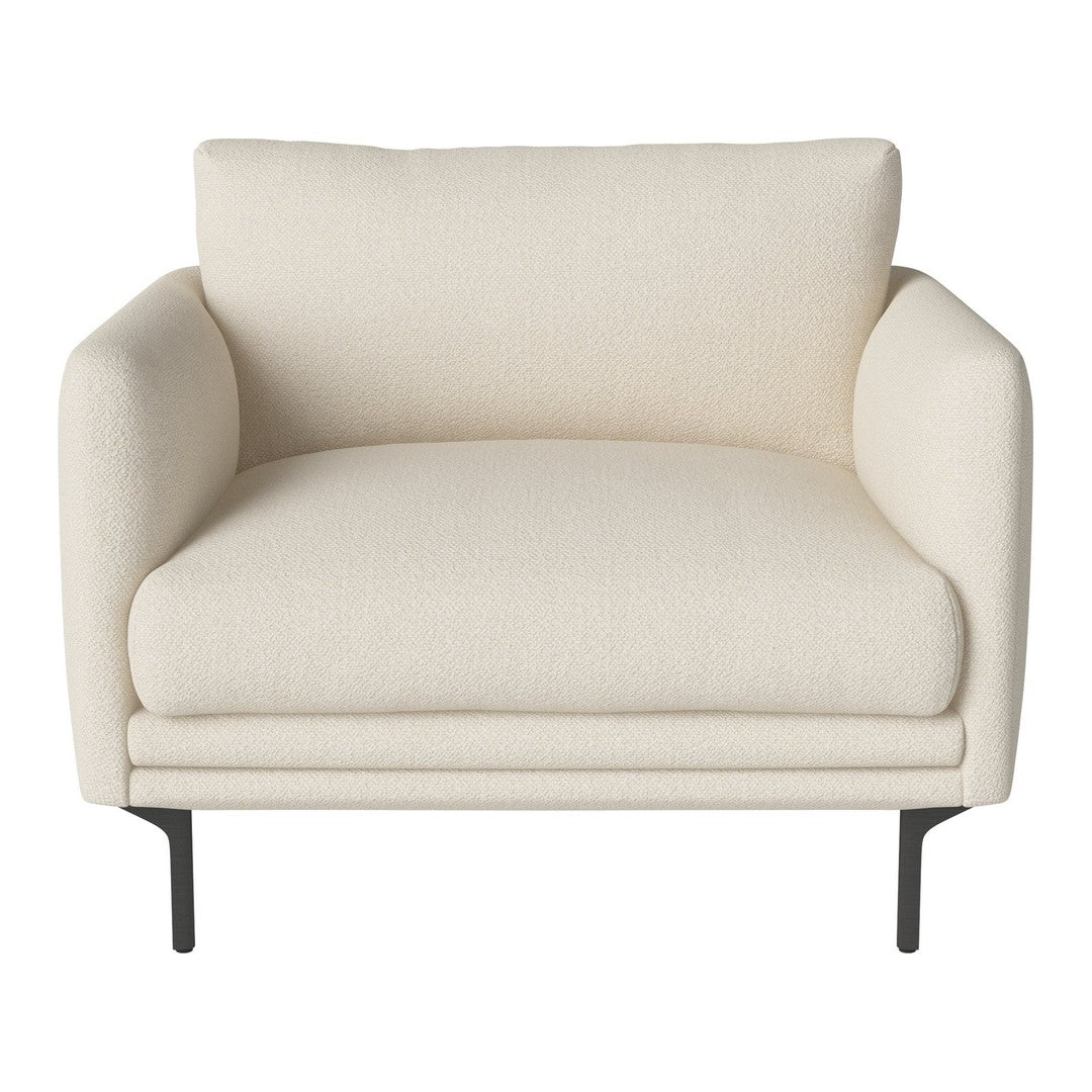 Beige modern armchair with smooth upholstery and sleek black metal legs. Ideal for minimalist interior design.