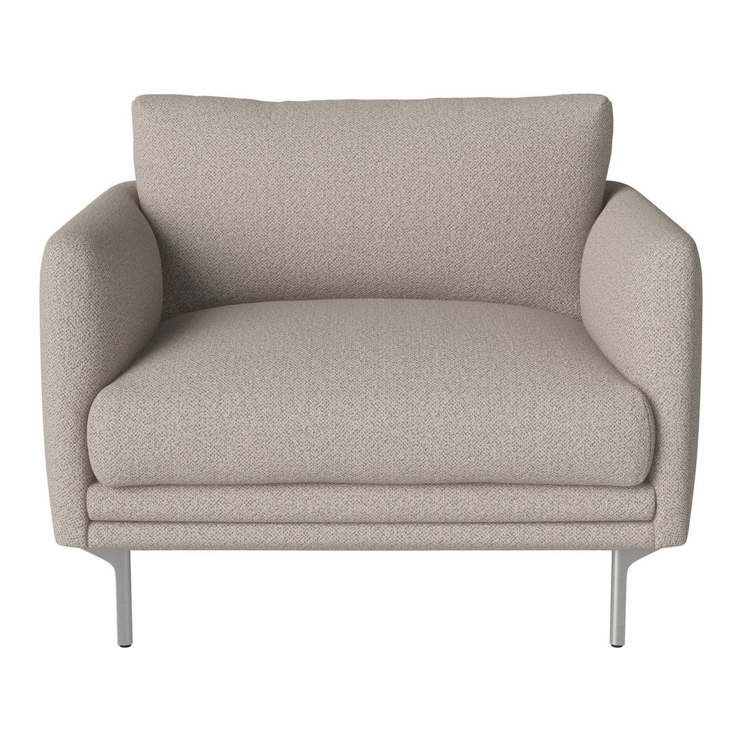 Beige upholstered armchair with a textured fabric, featuring a minimalist design and sleek metal legs.