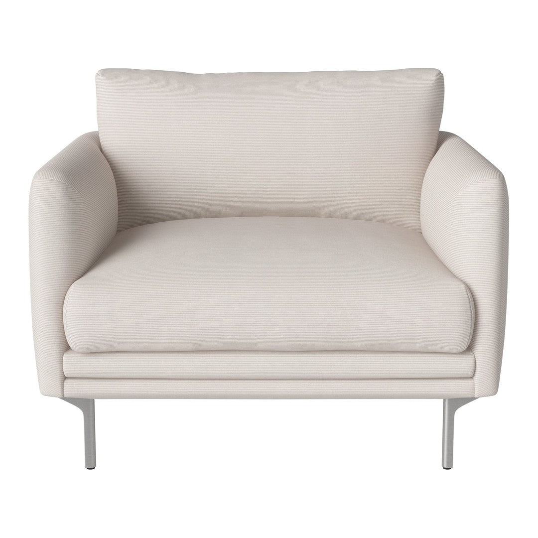 Cream-colored modern armchair with smooth fabric and minimalist design, featuring sleek metal legs.
