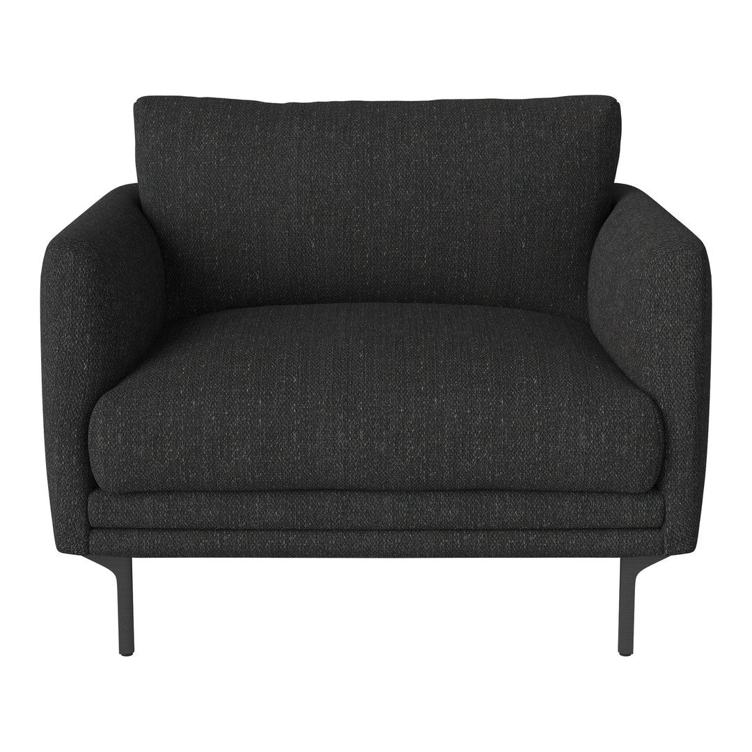 "Modern black lounge chair with a textured upholstery and sleek metal legs."