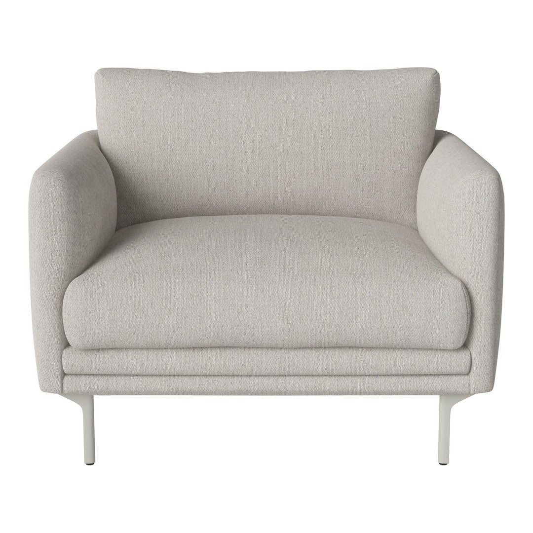 Light beige upholstered armchair with smooth texture and minimalist design, perfect for modern decor.