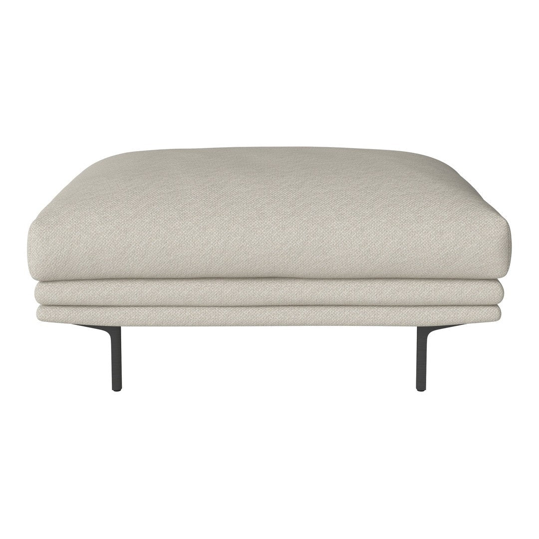 Light beige accent ottoman with a smooth texture and minimalist black metal legs. Perfect for modern decor.