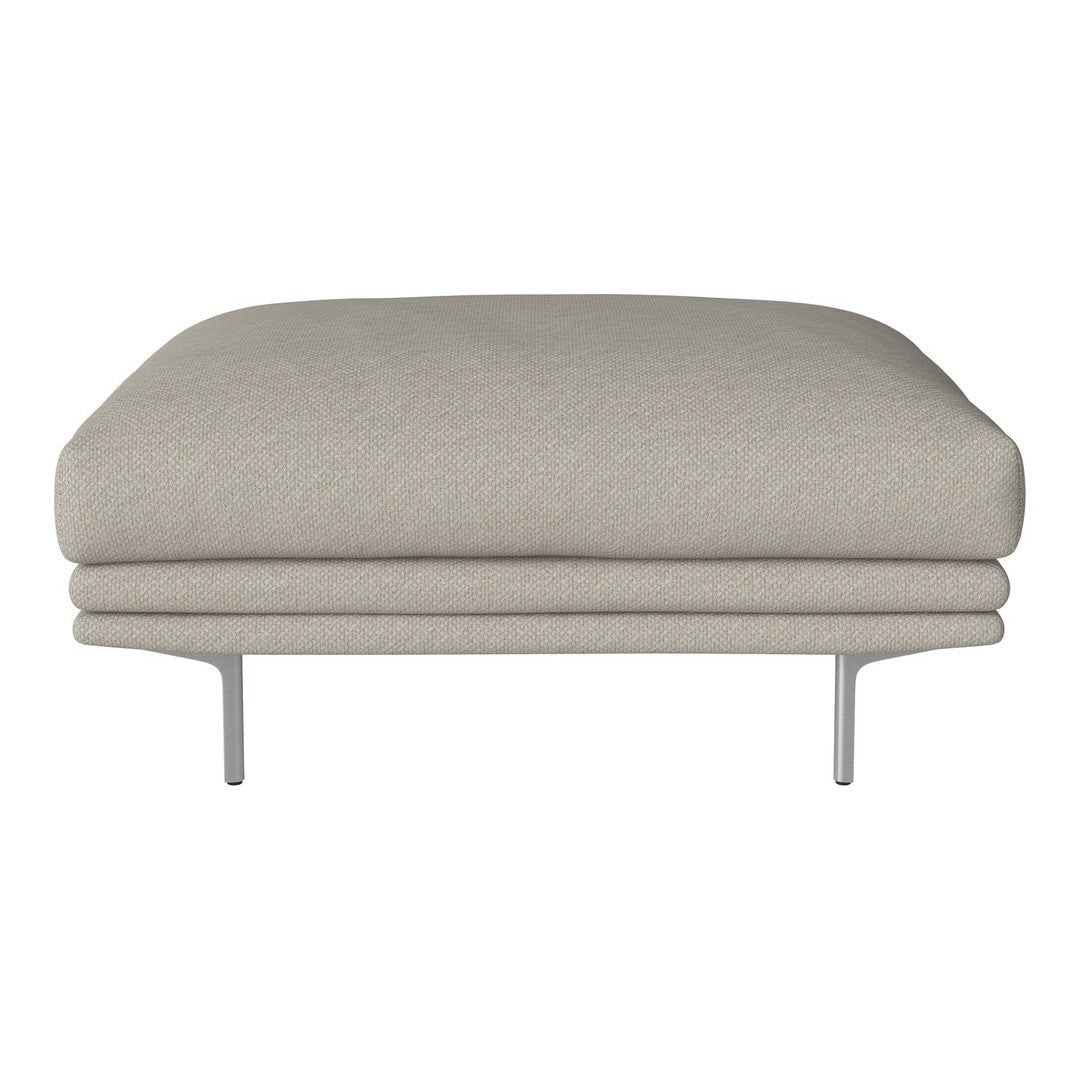 Light gray ottoman with smooth texture and minimalist design, featuring a subtle pattern and sleek metal legs.