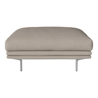 Beige upholstered ottoman with a smooth texture and minimalist design on sleek metal legs.