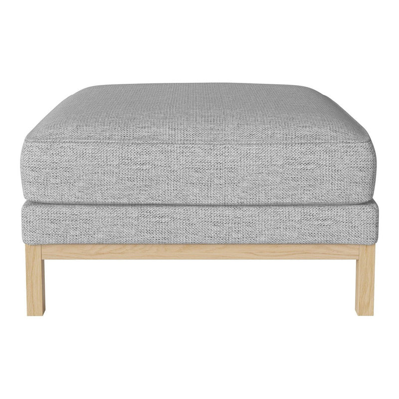 Gray upholstered ottoman with a textured fabric and natural wood legs, perfect for modern decor.