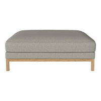 Light gray upholstered ottoman with a wooden base, featuring a solid color design for a modern look.