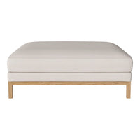 Beige upholstered ottoman with a sleek wooden base, showcasing a minimalist design and smooth, clean lines.