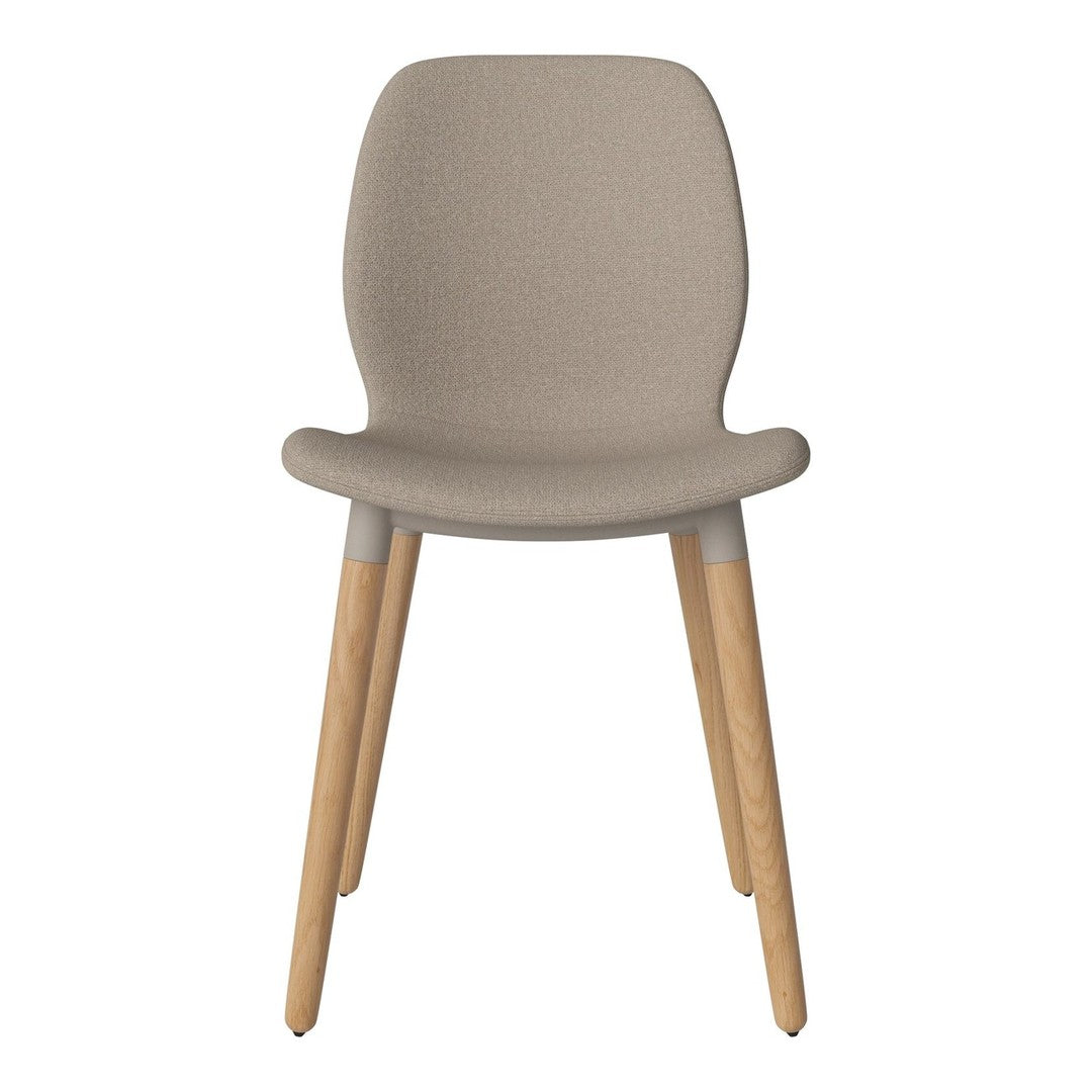 Beige upholstered chair with smooth contours and light wooden legs. Simple, modern design for versatile decor.
