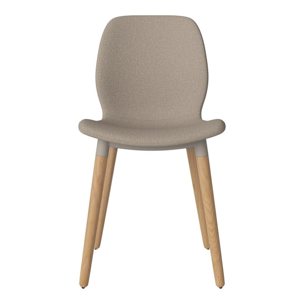 Beige upholstered chair with smooth contours and light wooden legs. Simple, modern design for versatile decor.