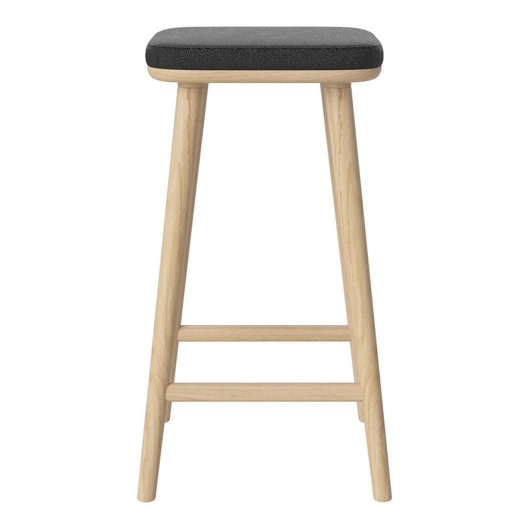Black padded top on natural wood legs bar stool with a simple, modern design. Ideal for stylish interiors.