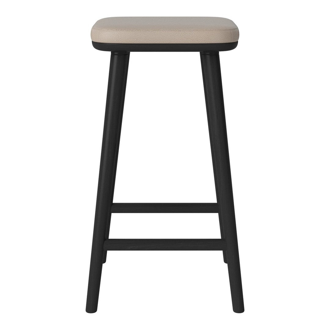 Beige padded seat with a sleek black frame, perfect for modern decor. Simple and elegant design.