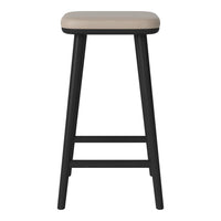 Beige padded seat with a sleek black frame, perfect for modern decor. Simple and elegant design.