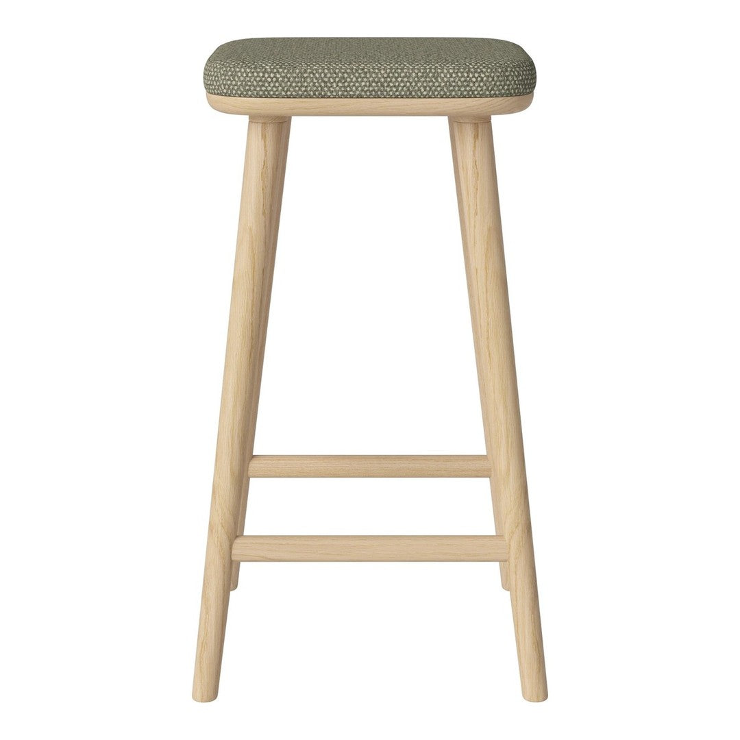 Green patterned seat bar stool with natural wood legs, stylish and modern design for any space.