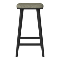 Black wooden bar stool with a textured light green fabric seat. Simple, modern design enhances any decor.