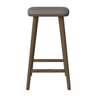 Gray upholstered bar stool with natural wood legs, featuring a minimalist design and subtle texture.