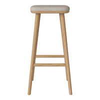 Light beige upholstered seat with natural wood legs, simple and modern design, ideal for contemporary spaces.