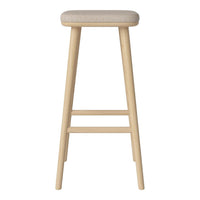 Light wood bar stool with a beige fabric seat, featuring a simple, clean design and natural finish.