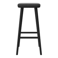 Black wooden bar stool with a simple, solid pattern and minimalistic design. Upholstered seat in dark gray.
