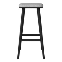 Black wooden bar stool with a solid gray upholstered seat, featuring a modern, minimalist design.
