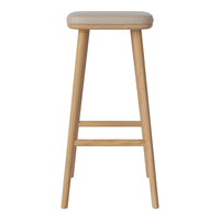 Light beige seat with natural wood legs, creating a minimalist and modern design perfect for any decor.