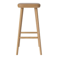 Light tan wooden bar stool with a smooth padded seat and natural wood legs, showcasing a minimalist design.