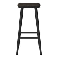 Black wooden bar stool with a textured dark fabric seat, featuring a minimalist design and clean lines.