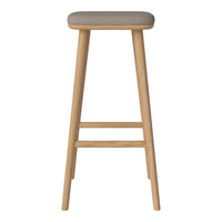 Light beige upholstered seat with natural wood legs, featuring a simple and modern design.