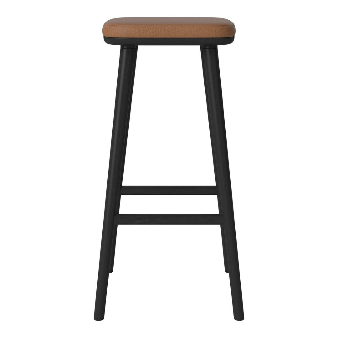 Brown padded seat with black wooden legs, minimalistic design perfect for modern spaces.