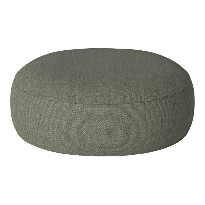 Round olive green pouf with a textured fabric surface, perfect for versatile home styling.