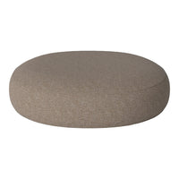 Round, beige cushion with a textured fabric, perfect for modern decor. Soft, neutral tones enhance any space.