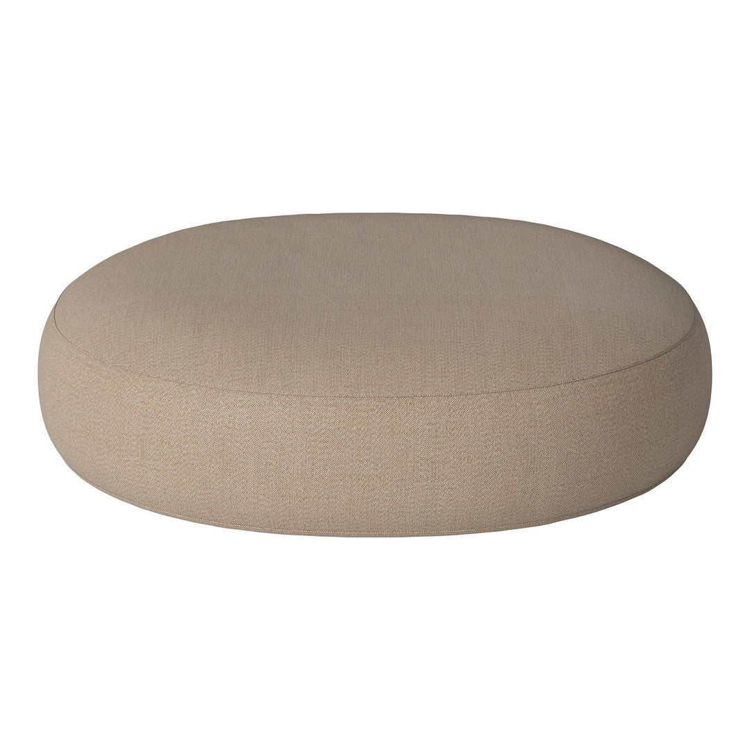Beige round cushion with a smooth, textured fabric, perfect for modern decor. Simple design for versatile styling.