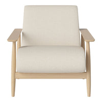 Cream upholstered chair with light wood arms, featuring a minimalist design and textured fabric for a cozy feel.