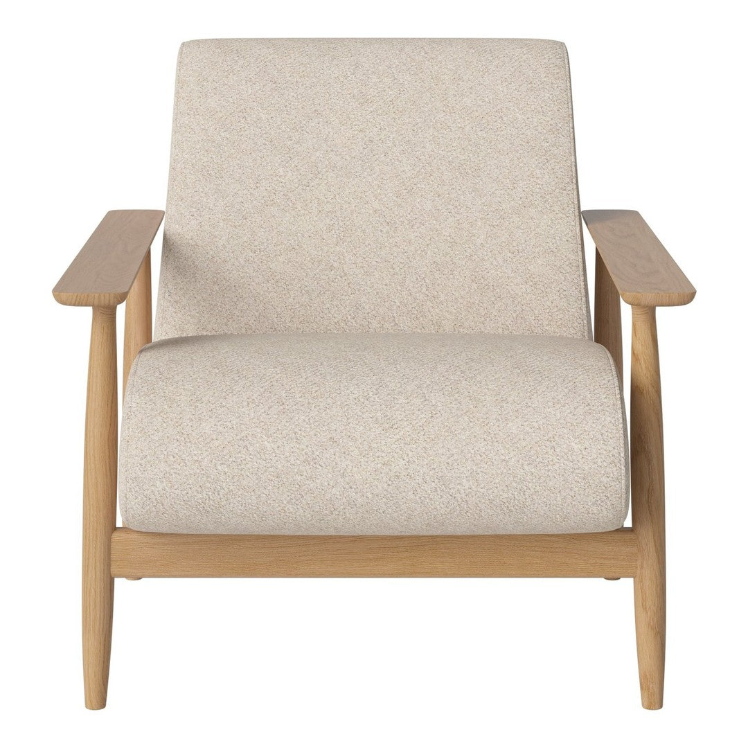 Beige patterned fabric armchair with light wood frame and minimalist design. Perfect for modern decor.