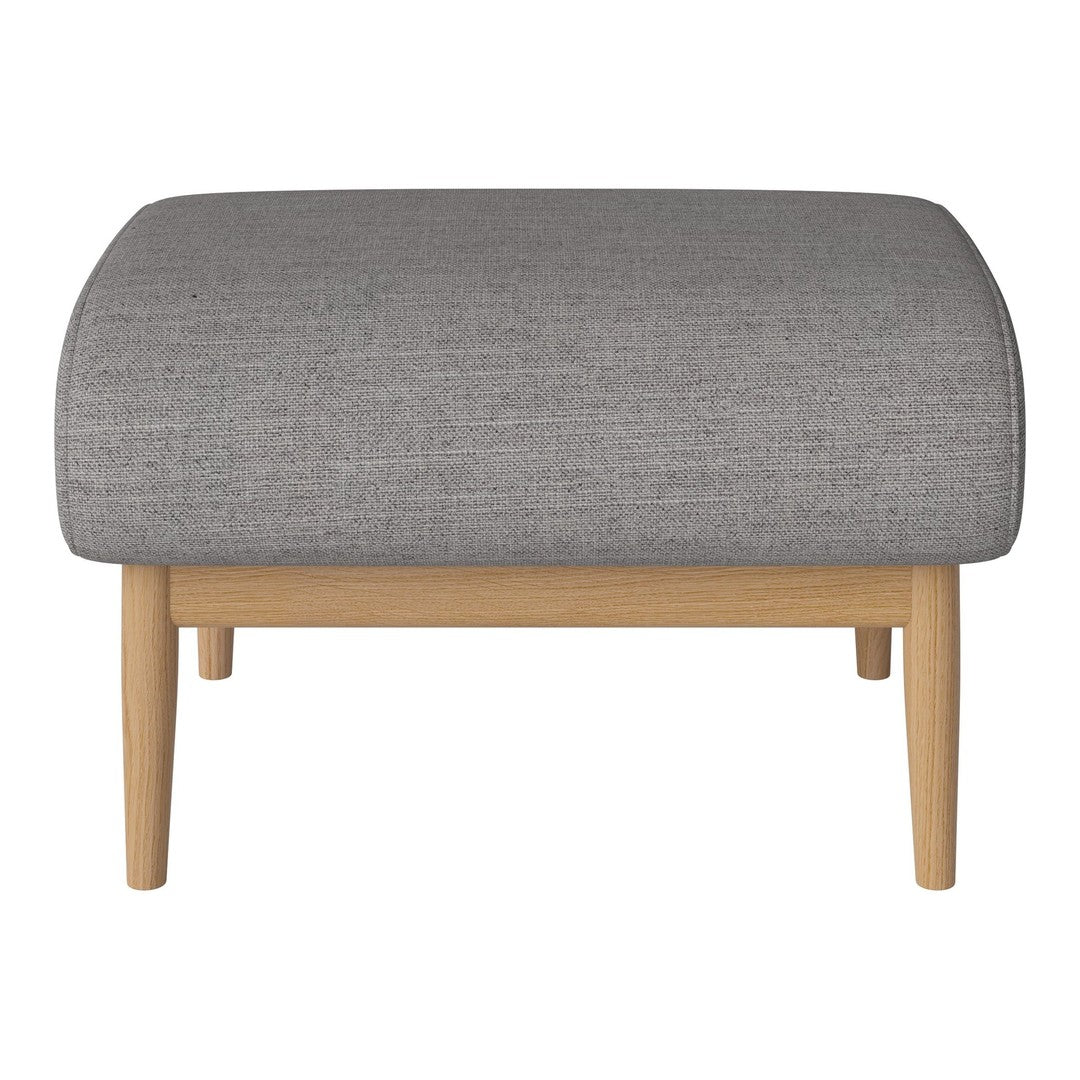 Gray tufted ottoman with a rounded shape and natural wood legs, featuring a subtle woven texture.