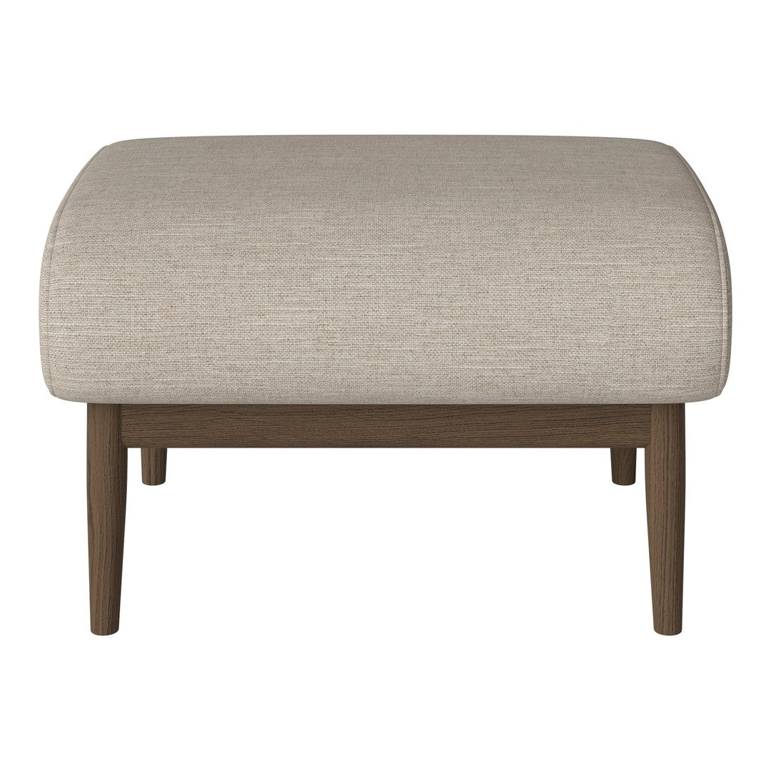 Beige upholstered ottoman with a smooth texture and dark wood legs, blending modern simplicity with cozy elegance.
