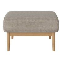 Grey striped ottoman with light wooden legs, adding a modern touch to any living space.