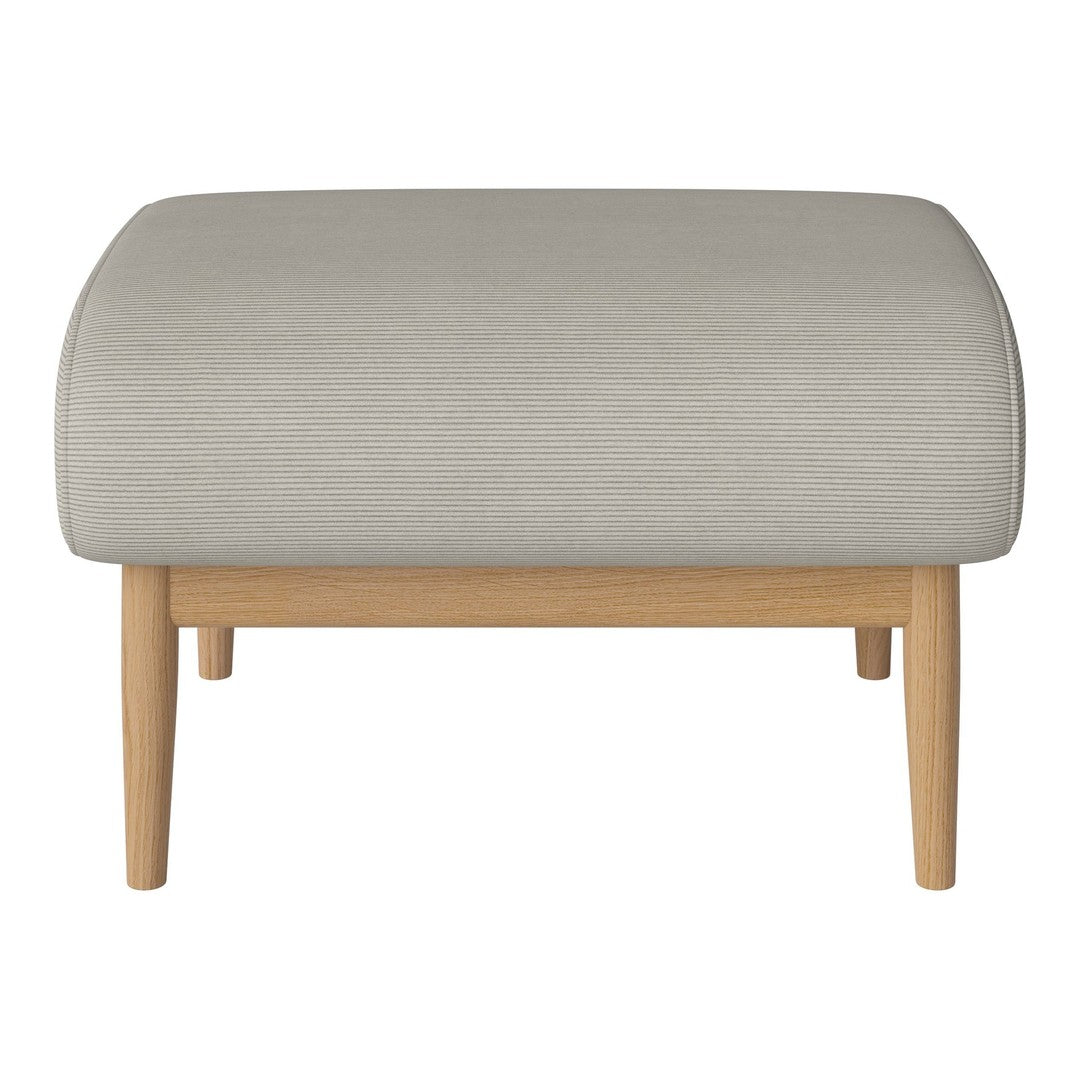 Light gray upholstered ottoman with smooth surface and natural wood legs, perfect for modern decor.