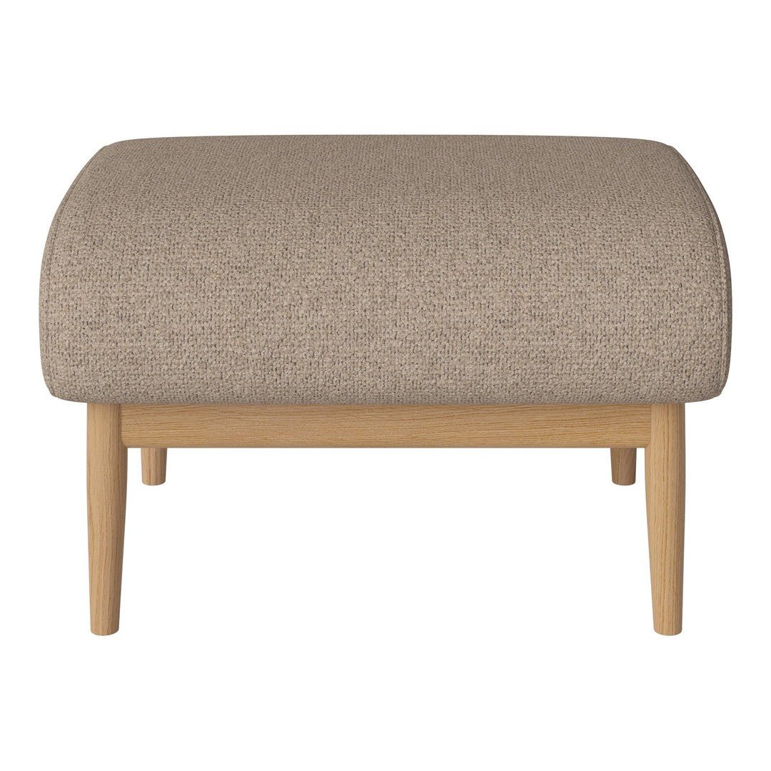 Beige upholstered ottoman with smooth texture and light wood legs, offering a minimalist aesthetic.